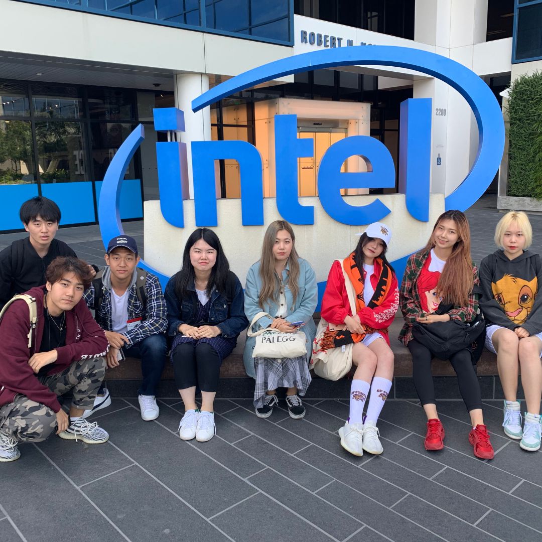 Touring English language students outside Intel headquarters