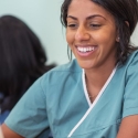 Medical assistant students in class look at computer