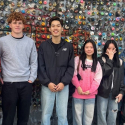 International students in front of street art