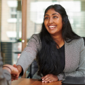 Paralegal shakes hands at a job interview