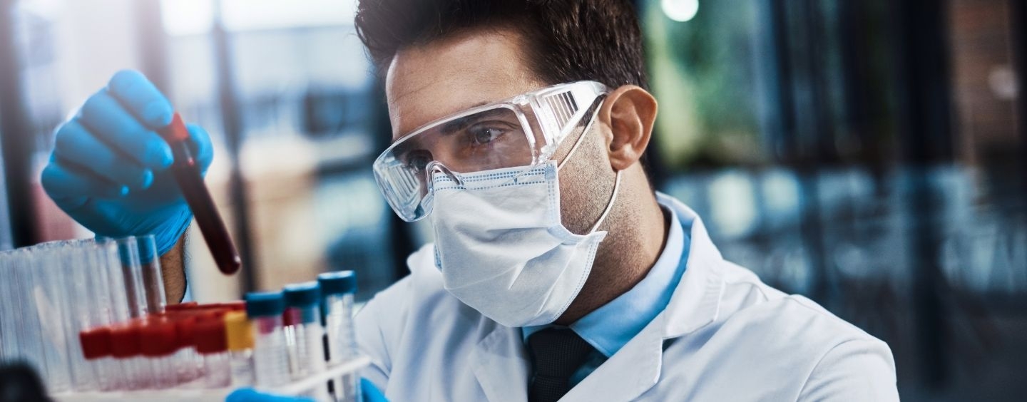 Specialist in Blood Bank Technology (SBB) in the lab working with samples