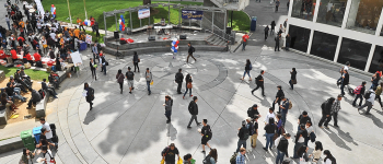 Aerial view of a bustling Malcolm X Plaza